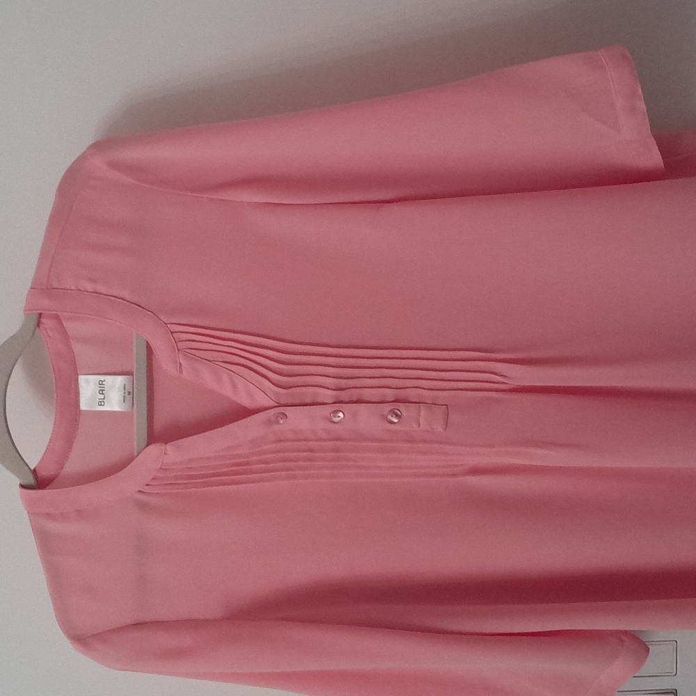 Elegant and casual pnk blouse never use.